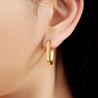 Arc hoop earrings in 925 sterling silver with warm gold finish and U-shape geometric design