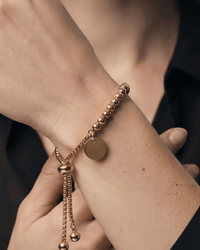 Stainless steel beaded ball chain bracelet with round coin charm and adjustable slider