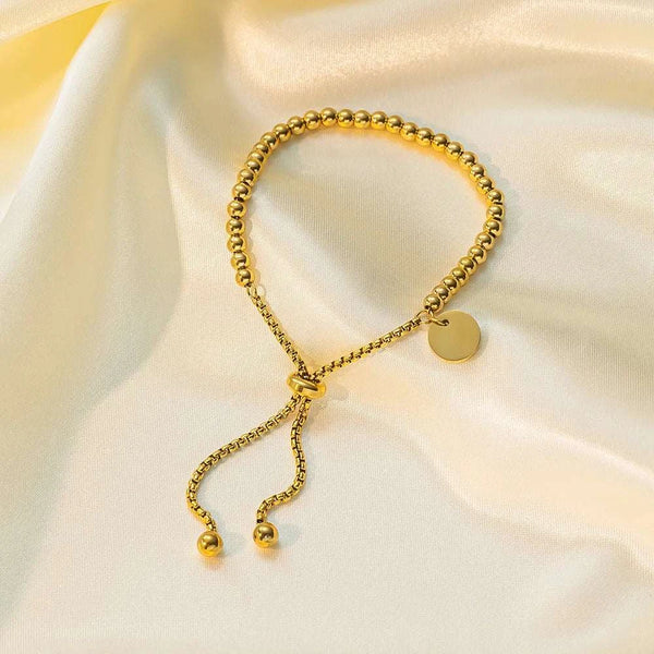 Stainless steel beaded ball chain bracelet with round coin charm and adjustable slider closure