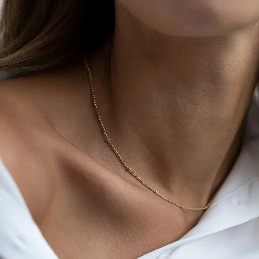 Delicate stainless steel beaded chain choker necklace in gold finish