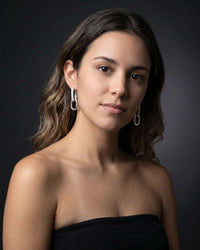 Silver plated cascade link drop earrings with pavé cubic zirconia top and polished oval link