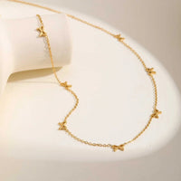 Gold stainless steel dainty bow charm choker necklace