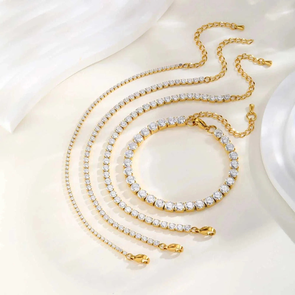 Gold dainty zirconia tennis chain bracelet on wrist