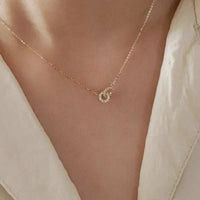 Double ring zircon pendant necklace in 925 sterling silver on a classic o-chain