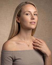 Double ring sterling silver pendant necklace with zircon accent