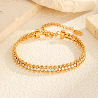 Duet Glow gold stainless steel double row tennis bracelet with white zirconia stones