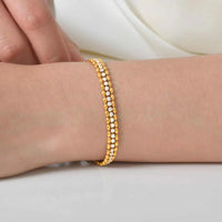 Duet Glow double row gold stainless steel tennis bracelet with white cubic zirconia
