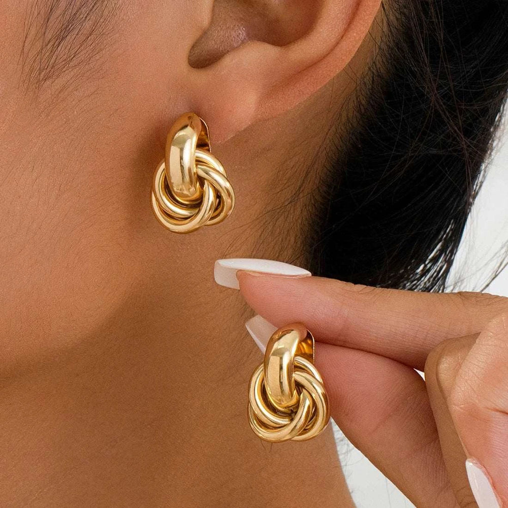 Gold double ring eclipse hoop earrings chunky geometric design