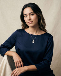 stainless steel embossed tulip coin pendant necklace on flat snake chain