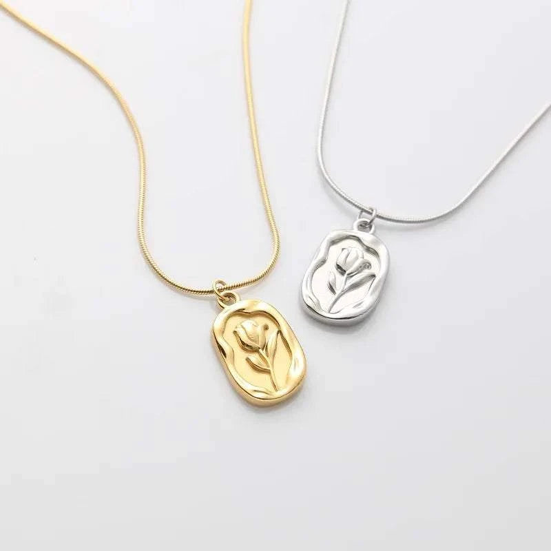 stainless steel embossed tulip coin pendant necklace on flat snake chain