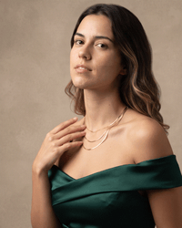 Flat herringbone snake chain necklace in gold and silver stainless steel with smooth, polished surface and multiple widths and lengths