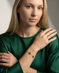Gold flower clover bracelet with micro pave zircon stones