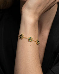 Gold flower clover bracelet with micro pave zircon stones