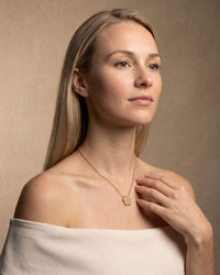 Gold flower clover necklace with micro pave zircon stones