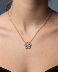gold flower clover necklace with micro pave zircon stones