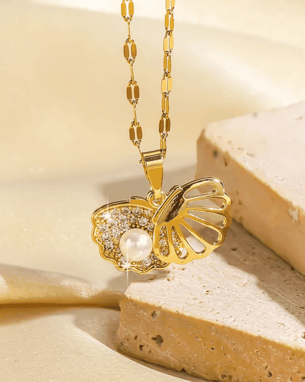 gold heart shell pendant necklace on delicate chain