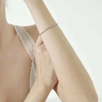 Infinite Glow Tennis Bracelet in 18K gold plating with adjustable slider