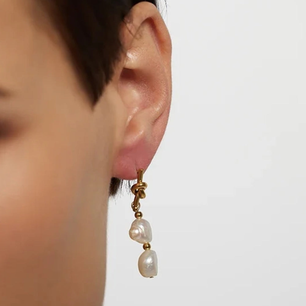 Knotted 14k gold pearl drop earrings with geometric knot and freshwater pearl