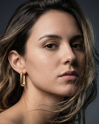 18K gold plated elongated oval Soho hoop earrings with polished finish