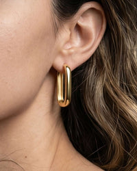 18K gold plated Soho elongated oval hoop earrings with hinged closure