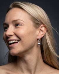 stainless steel sweetheart huggie earrings with puffed heart charm