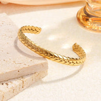 Stainless steel wheat braid open cuff bangle in gold finish